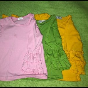 Various ruffle shirts and pants